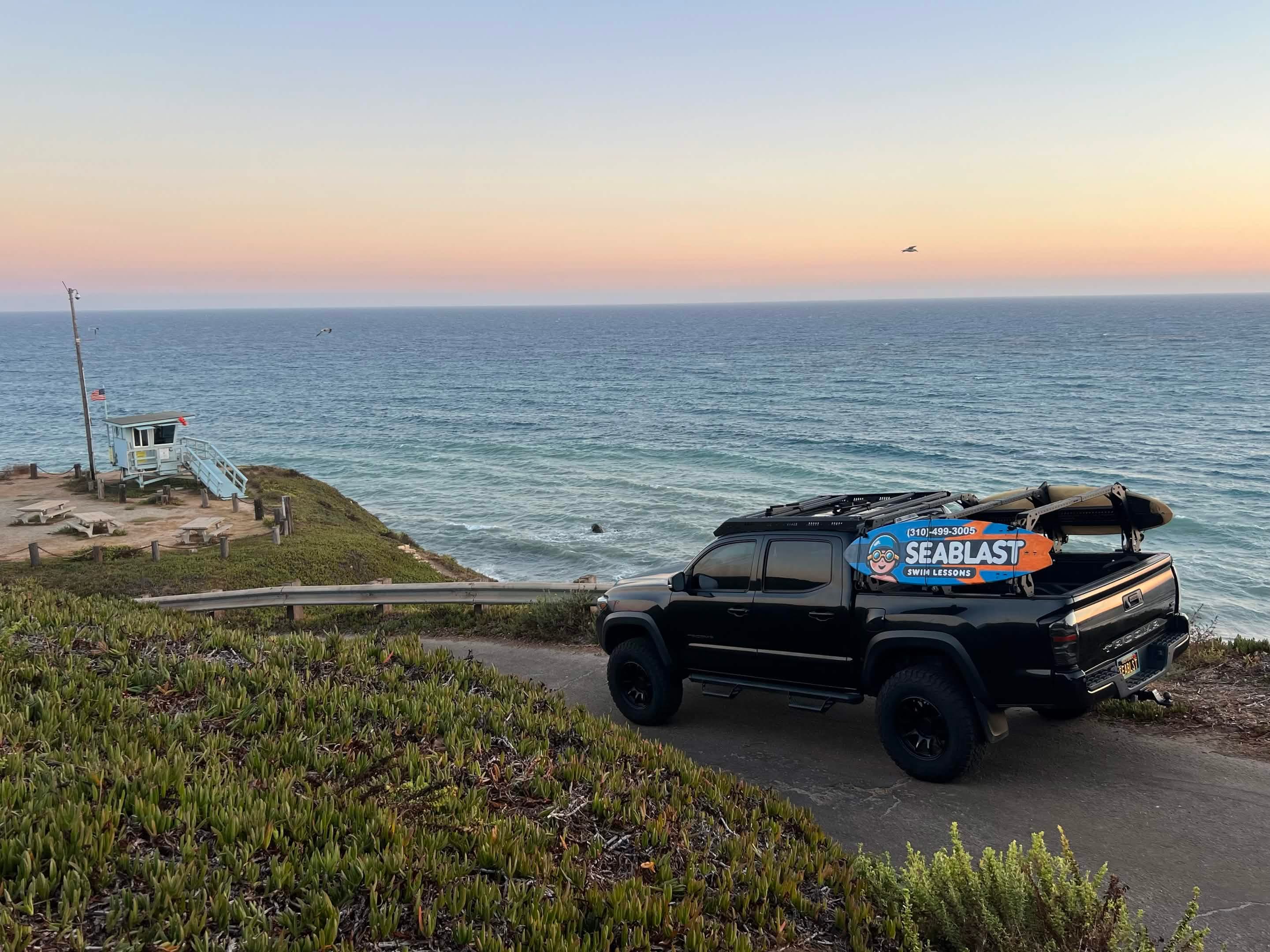 Seabass Aquatics lifeguard truck overlooking the coast